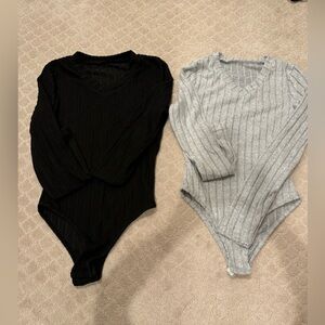 2 Soft V-Neck Bodysuits.  Selling as a pair.